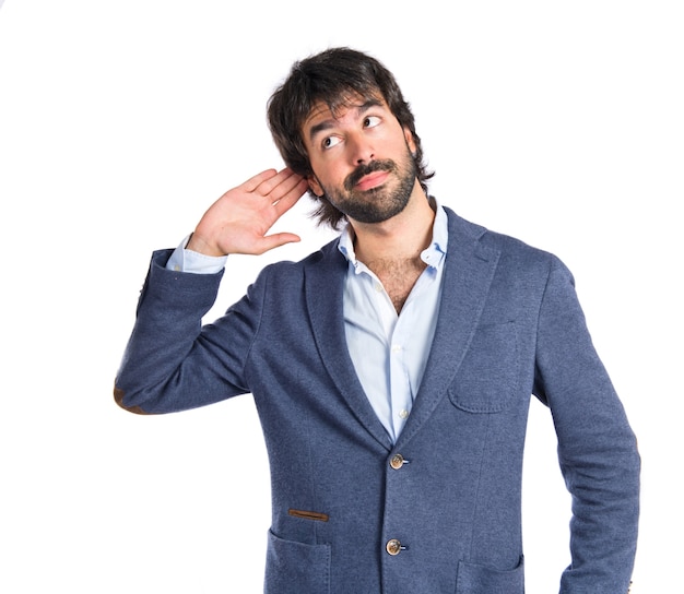 Man listening over isolated white background