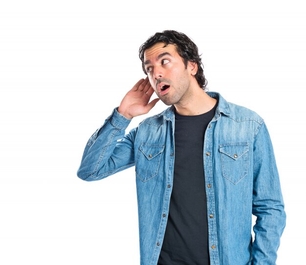 Man listening over isolated white background