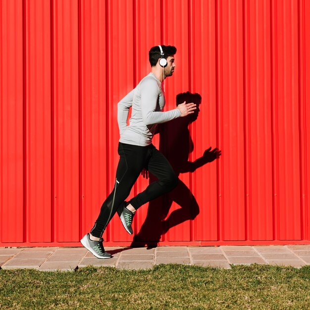 Man listening to music and running