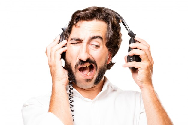 Man listening to music with headphones black and disgust face