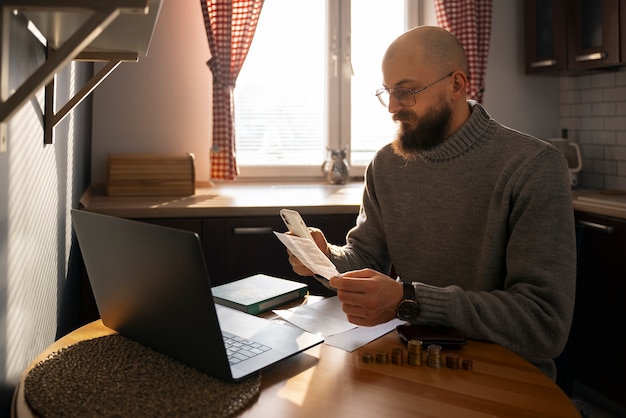 Man looking bill during energy crisis