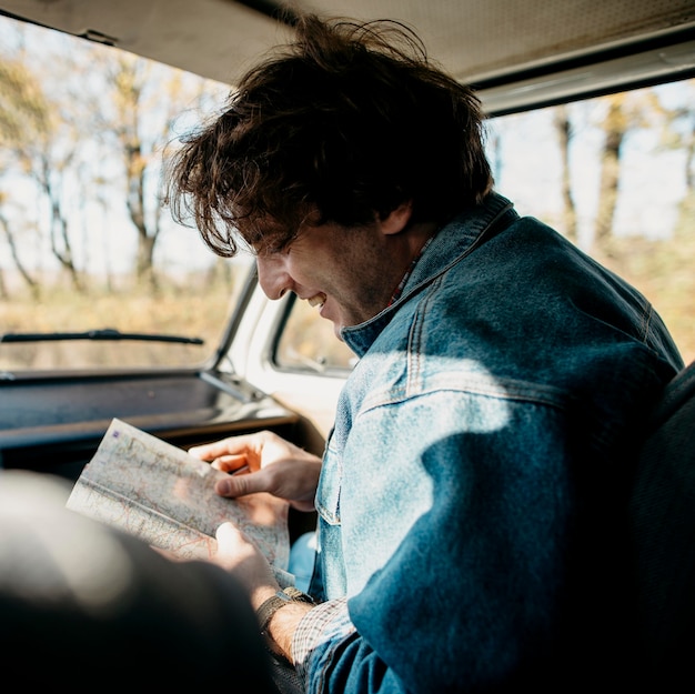 Man looking at a map for new locations