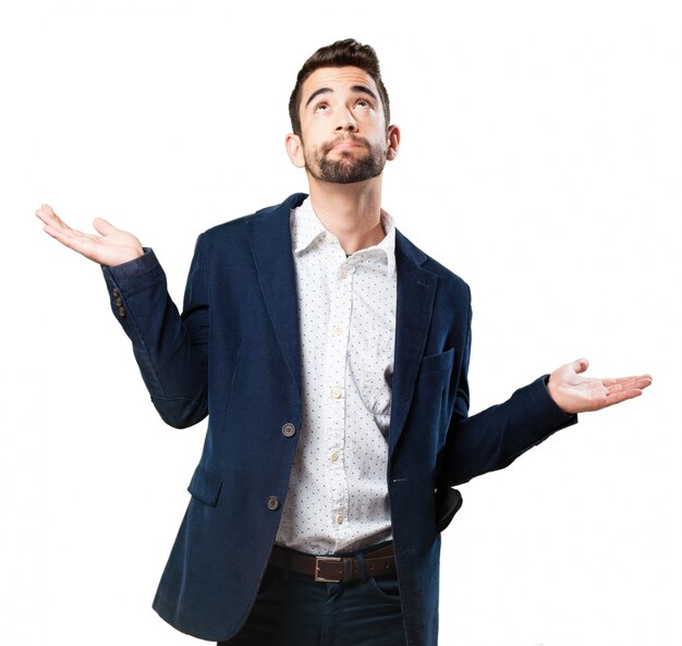 Man looking at sky with raised palms