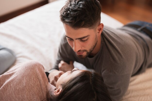 Man looking at woman