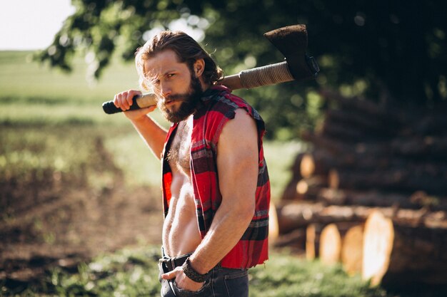 Man lumberjack in forest