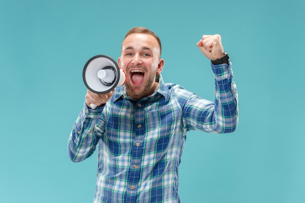 Free photo man making announcement with megaphone