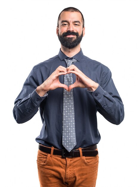 Man making a heart with his hands