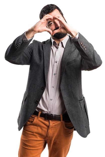 Man making a heart with his hands