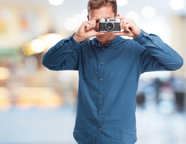 Man making a photo with an old camera