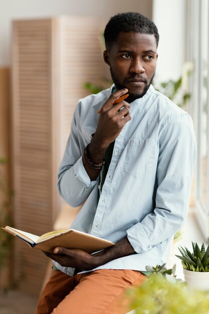 Man making plans to redecorate house