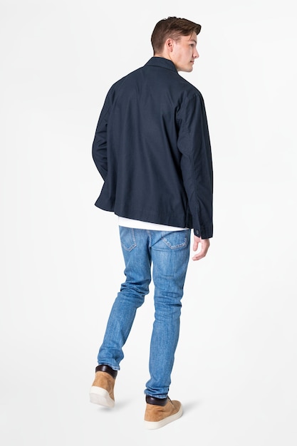 Man in navy jacket and jeans streetwear