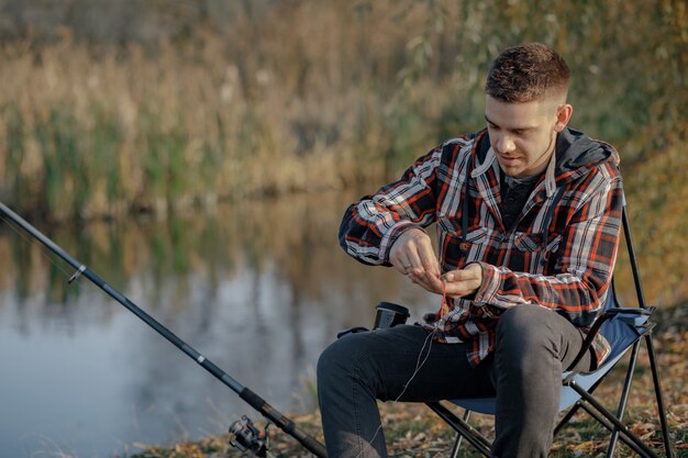 man near river in a fishing morning