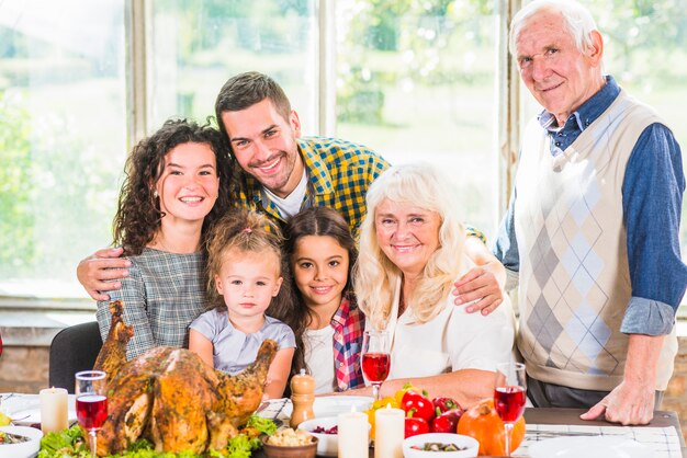 Man near woman, children and elderly couple