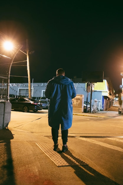 Man at night on the streets of the city