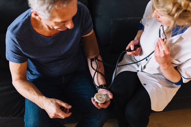 Man and nurse in old age home