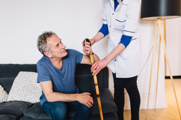 Man and nurse in retirement home