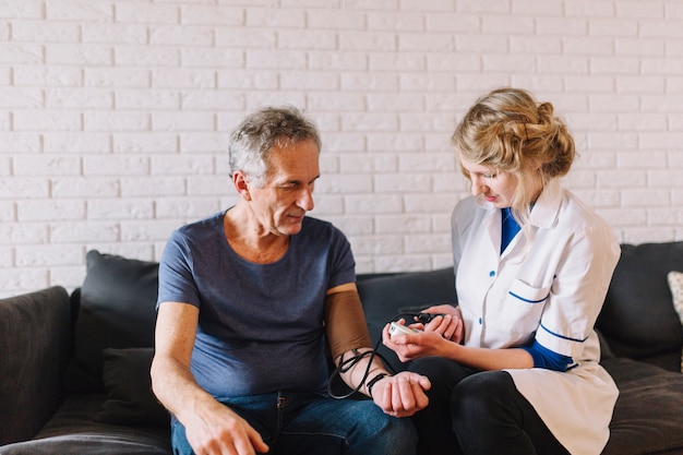 Man and nurse in retirement home