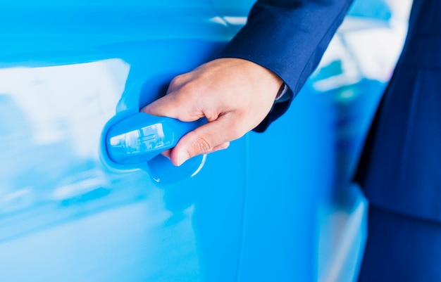 Man opening car door