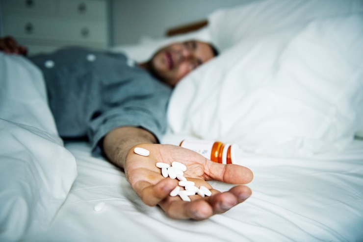 Free Photo man overdosed with medicine