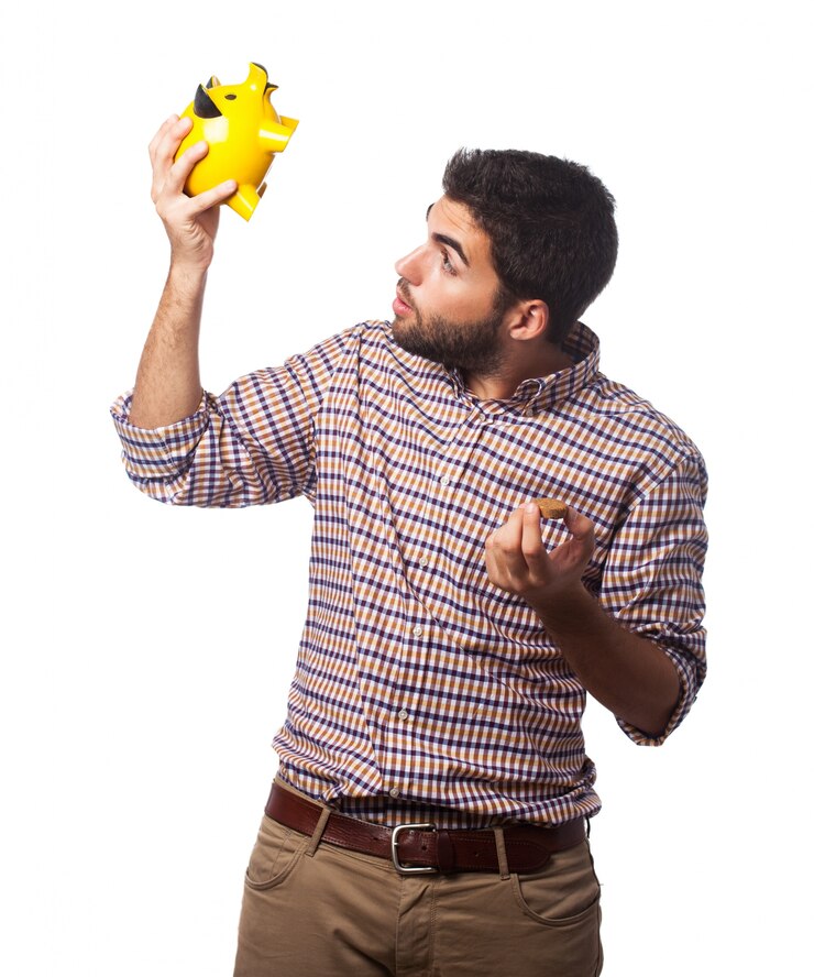 मुफ़्त फोटो man in plaid shirt looking in piggy bank