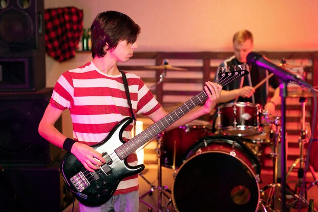 Man playing the electric guitar at a live concert