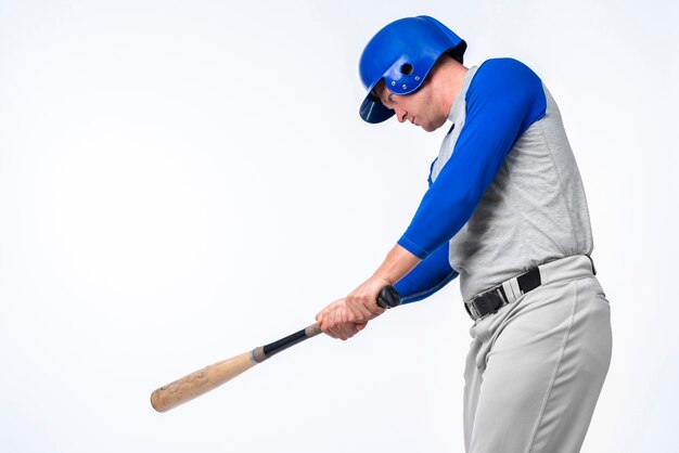 Man playing with baseball bat