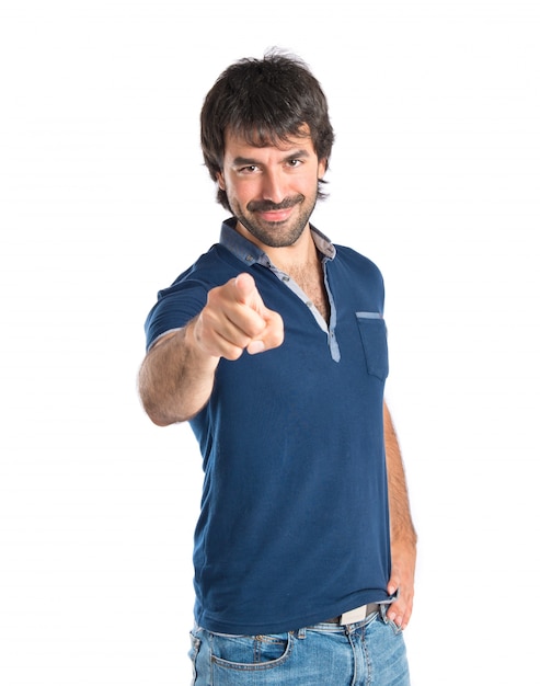 Man pointing to the front over white background