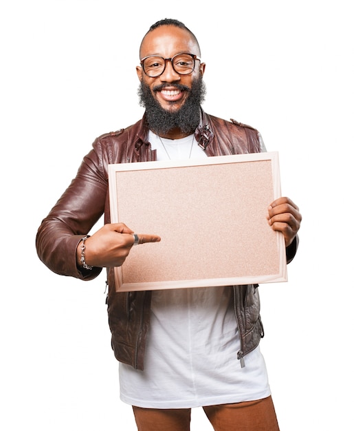 Man pointing his board