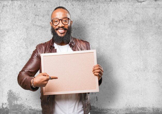 Man pointing his board