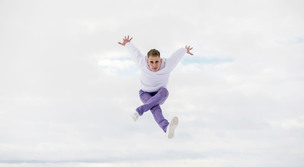 Man posing while dancing hip hop