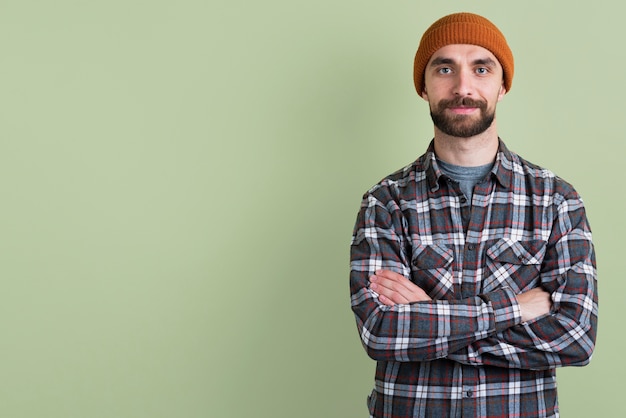 Man posing with crossed arms