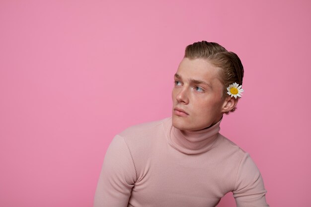 Man posing with flower front view