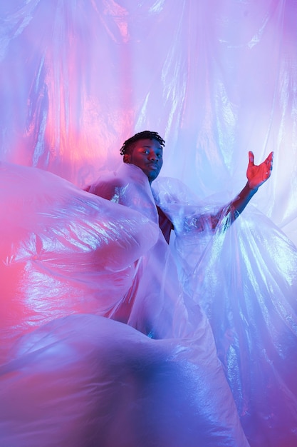 Man posing with plastic foil