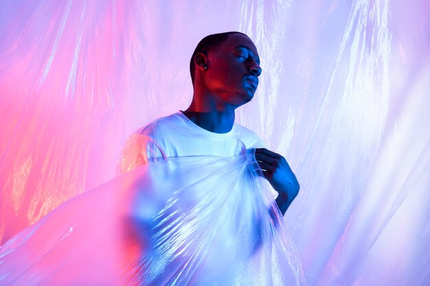 Man posing with plastic foil