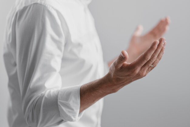 Man praying alone at divinity at home