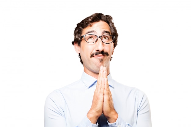 Man praying with folded hands