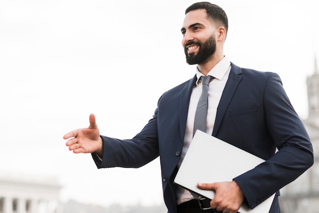 Man prepared to shake hands