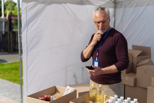 Man preparing a foodbank for poor people