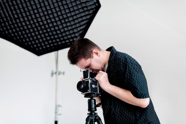 Man preparing the studio for a shooting