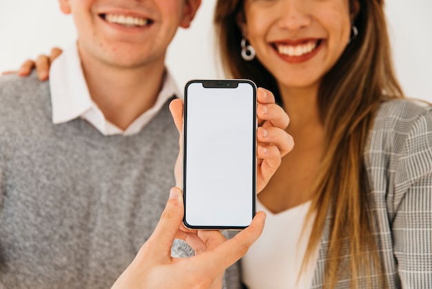 Man presenting new phone