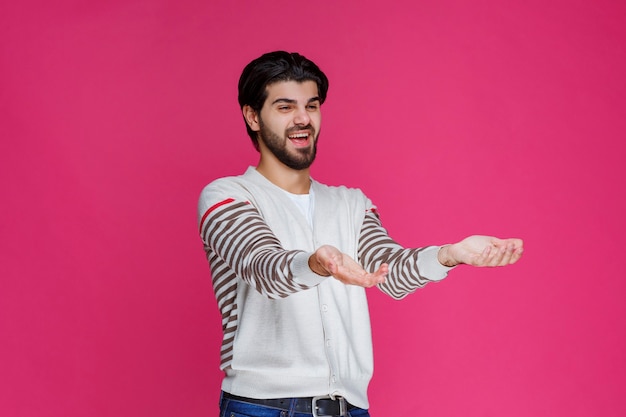 Man presenting someone with high passion and enthusiasm. 