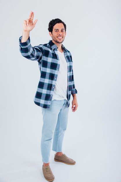 Man raising hand to order something