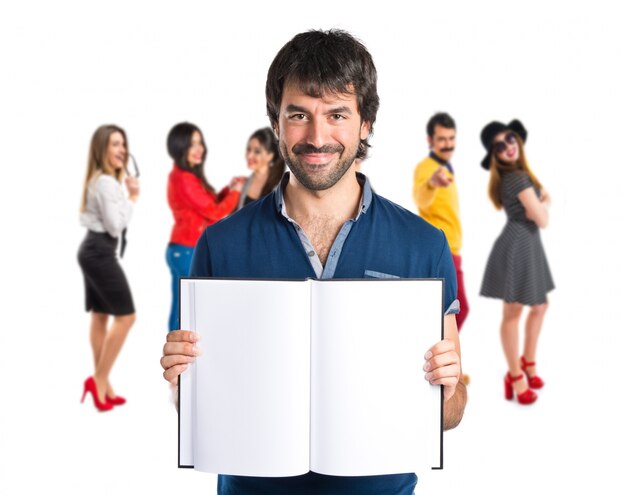 Man reading a book over white background