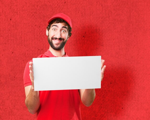 Man in red with a poster