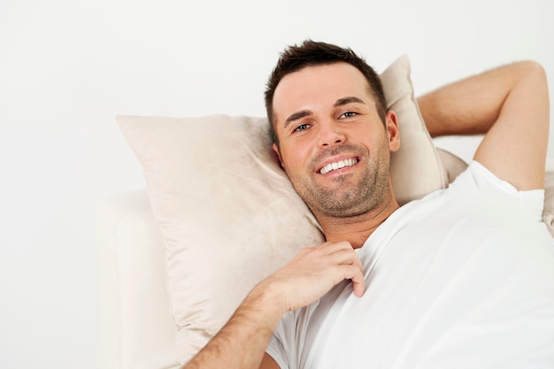 Man relaxing at home