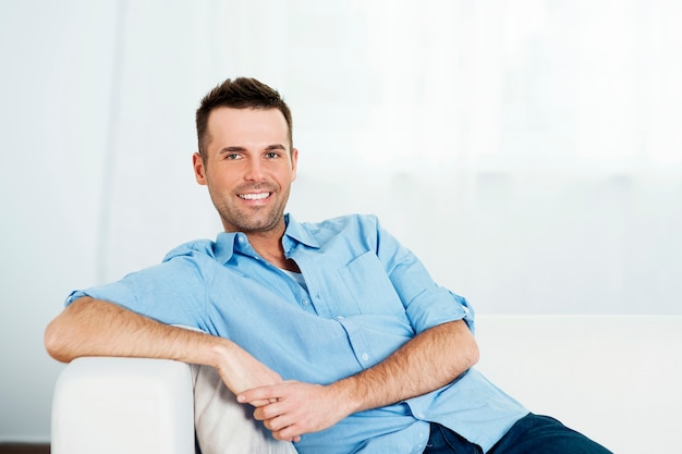 Man relaxing on sofa
