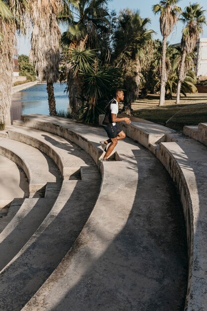 Man running on stairs full shot