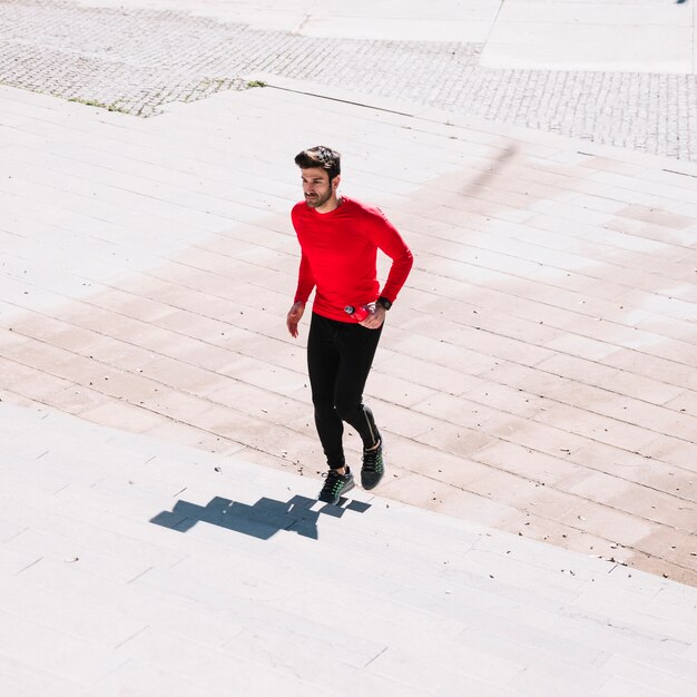 Man running up on stairs