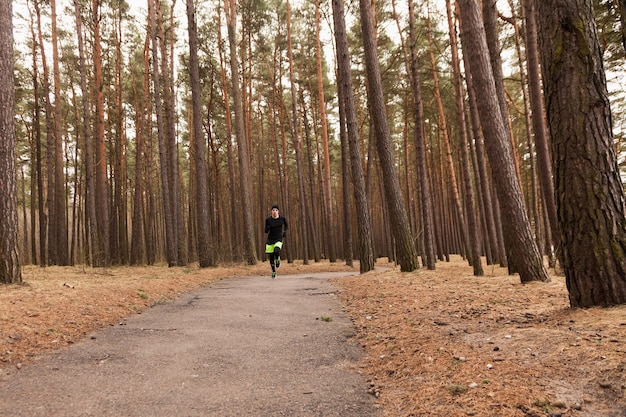 Man running in woods