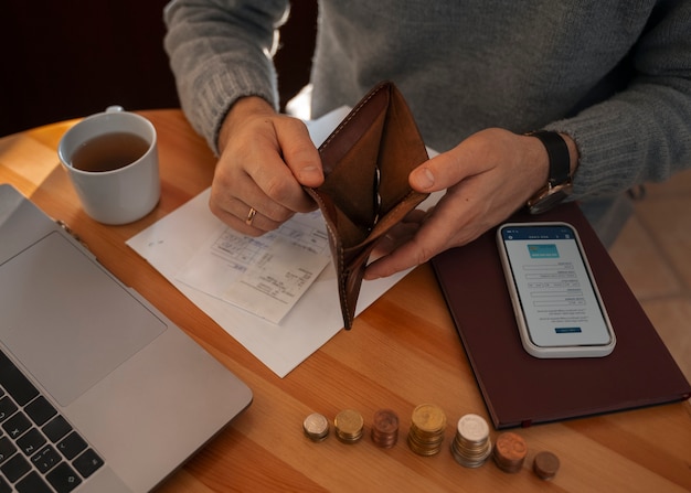 Free photo man saving money during energy crisis